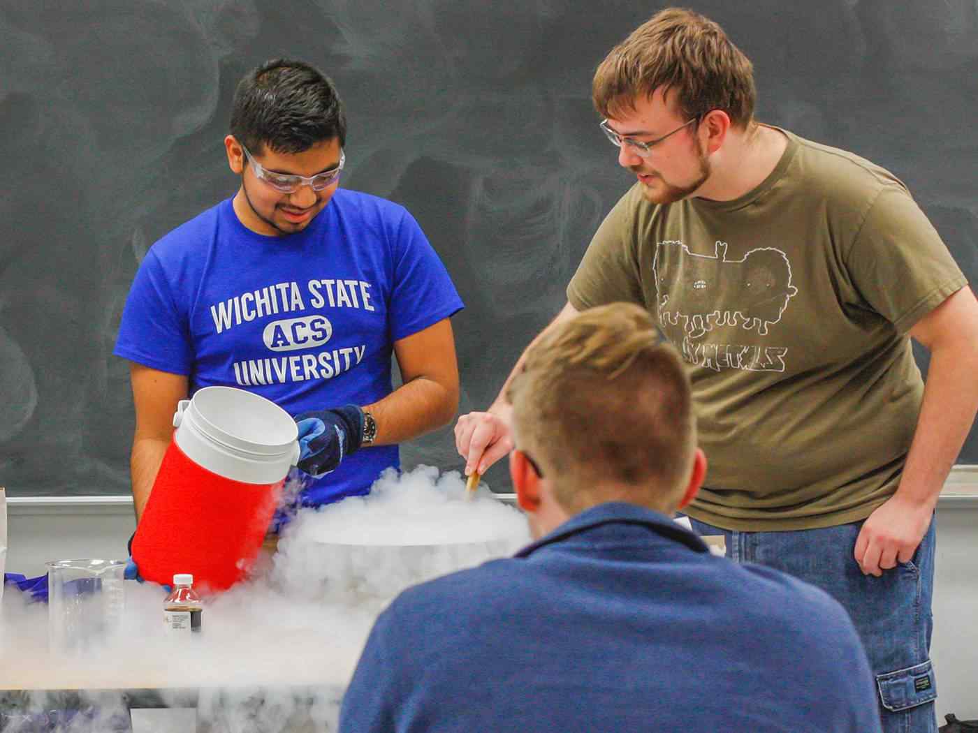 Student members of the American Chemical Society conduct a liquid nitrogen ice cream demonstration 