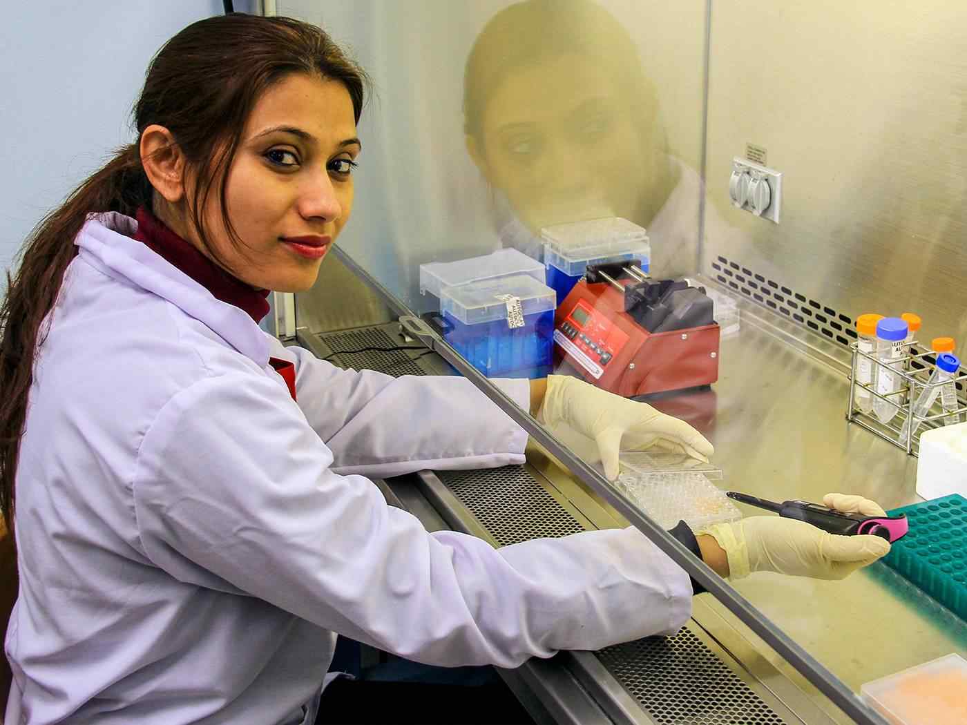 A student prepares samples in a lab
