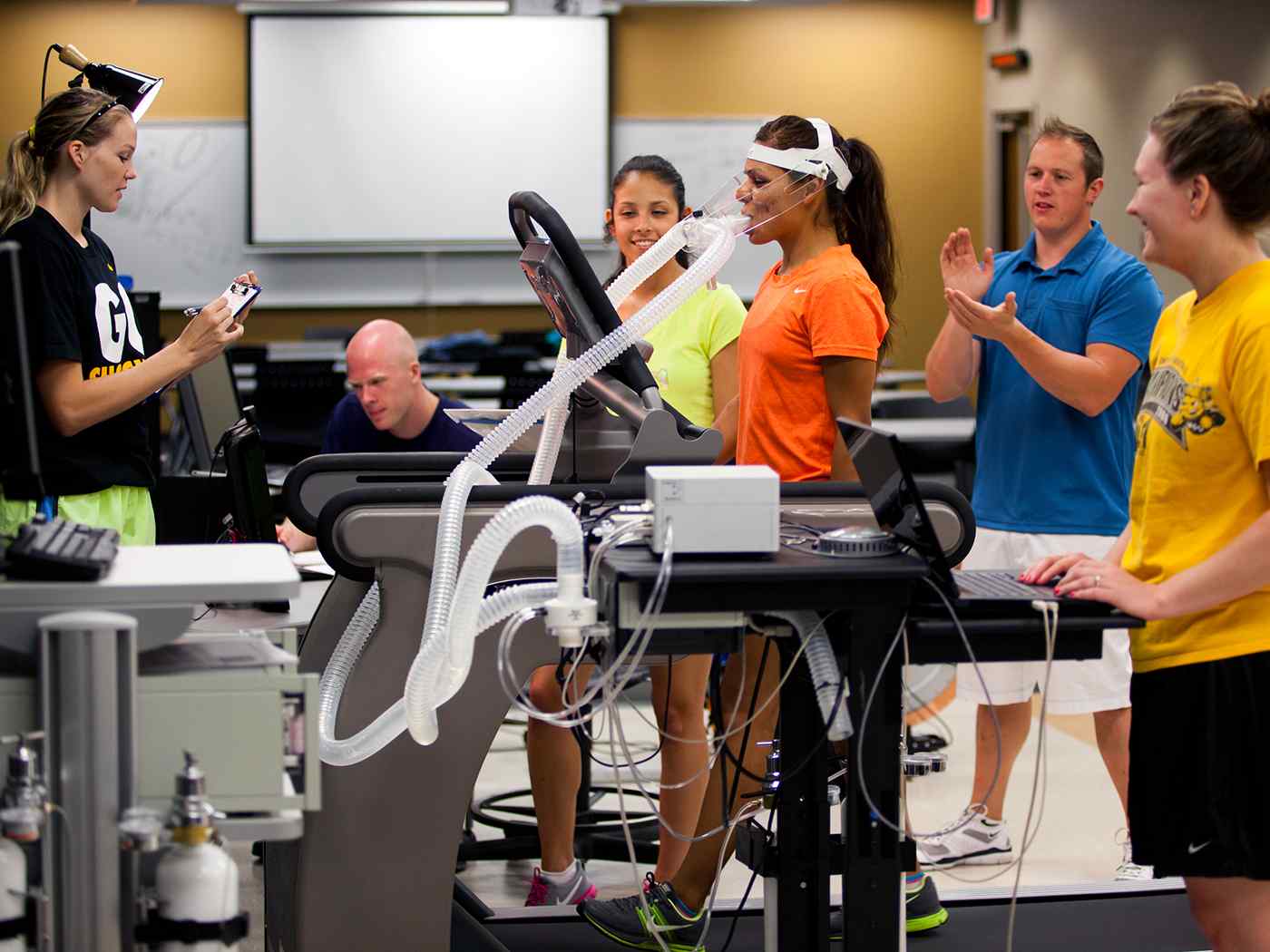 Exercise Science students perform an experiment in the human performance studies lab