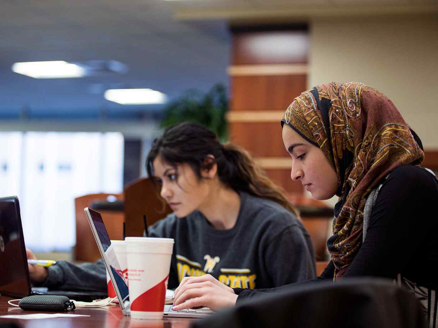Female students study for finals in the Rhatigan Student Center