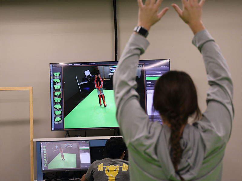 Exercise Science students performing a test in the Human Performance lab.